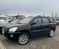 Чорний Кіа Sportage, об'ємом двигуна 2 л та пробігом 257 тис. км за 3472 $, фото 1 на Automoto.ua