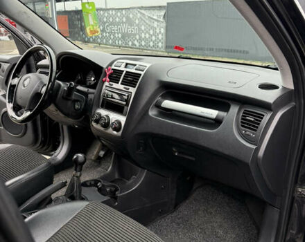Киа Sportage 2006 в Каменце-Подольском на Automoto.ua Черный Киа Sportage, объемом двигателя 1.98 л и пробегом 248 тыс. км за 6999 $, фото 23 на Automoto.ua