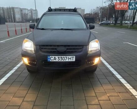 Черный Киа Sportage, объемом двигателя 2 л и пробегом 322 тыс. км за 7000 $, фото 7 на Automoto.ua