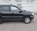 Черный Киа Sportage, объемом двигателя 2 л и пробегом 170 тыс. км за 8700 $, фото 1 на Automoto.ua