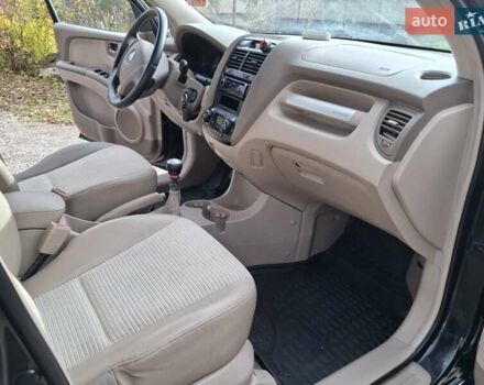 Черный Киа Sportage, объемом двигателя 1.99 л и пробегом 283 тыс. км за 6850 $, фото 45 на Automoto.ua