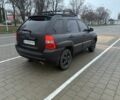 Черный Киа Sportage, объемом двигателя 2 л и пробегом 322 тыс. км за 7000 $, фото 4 на Automoto.ua