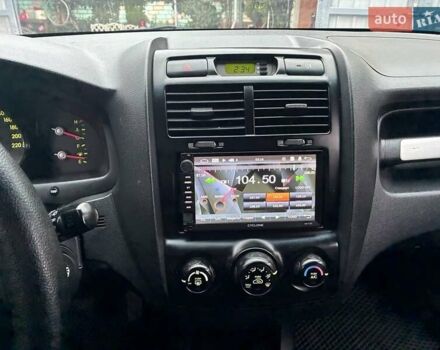 Черный Киа Sportage, объемом двигателя 2 л и пробегом 322 тыс. км за 7000 $, фото 5 на Automoto.ua