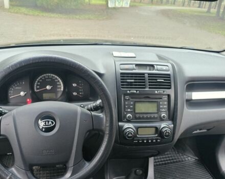 Чорний Кіа Sportage, об'ємом двигуна 2 л та пробігом 207 тис. км за 7000 $, фото 1 на Automoto.ua