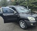 Чорний Кіа Sportage, об'ємом двигуна 2 л та пробігом 207 тис. км за 7000 $, фото 7 на Automoto.ua