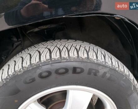 Чорний Кіа Sportage, об'ємом двигуна 2 л та пробігом 150 тис. км за 7000 $, фото 18 на Automoto.ua