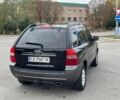 Черный Киа Sportage, объемом двигателя 2 л и пробегом 202 тыс. км за 6500 $, фото 4 на Automoto.ua