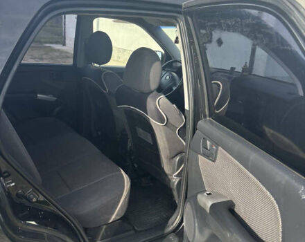 Черный Киа Sportage, объемом двигателя 2 л и пробегом 300 тыс. км за 6800 $, фото 5 на Automoto.ua