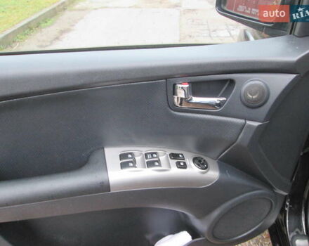 Черный Киа Sportage, объемом двигателя 2 л и пробегом 213 тыс. км за 7700 $, фото 24 на Automoto.ua