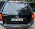 Чорний Кіа Sportage, об'ємом двигуна 2 л та пробігом 227 тис. км за 6900 $, фото 4 на Automoto.ua