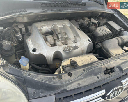 Черный Киа Sportage, объемом двигателя 2 л и пробегом 300 тыс. км за 6800 $, фото 8 на Automoto.ua