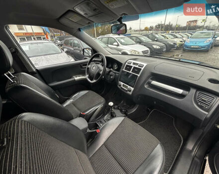 Чорний Кіа Sportage, об'ємом двигуна 2 л та пробігом 250 тис. км за 8300 $, фото 22 на Automoto.ua