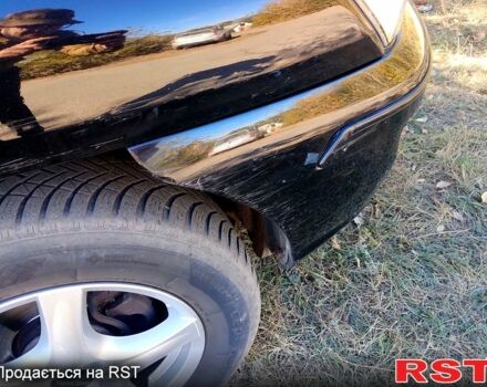 Чорний Кіа Sportage, об'ємом двигуна 2 л та пробігом 197 тис. км за 6900 $, фото 1 на Automoto.ua