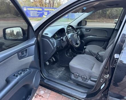 Чорний Кіа Sportage, об'ємом двигуна 2 л та пробігом 180 тис. км за 6700 $, фото 11 на Automoto.ua