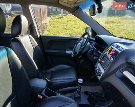 Черный Киа Sportage, объемом двигателя 1.99 л и пробегом 281 тыс. км за 6800 $, фото 7 на Automoto.ua