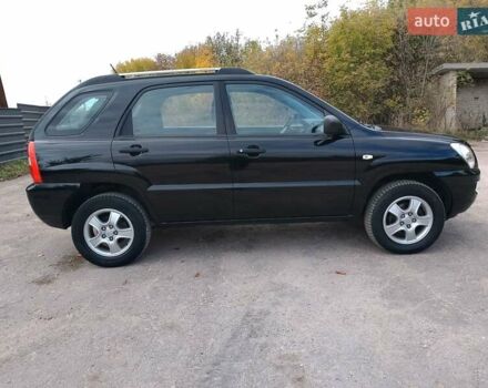 Чорний Кіа Sportage, об'ємом двигуна 2 л та пробігом 150 тис. км за 7000 $, фото 7 на Automoto.ua