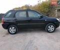 Чорний Кіа Sportage, об'ємом двигуна 2 л та пробігом 150 тис. км за 7000 $, фото 7 на Automoto.ua