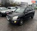 Чорний Кіа Sportage, об'ємом двигуна 2 л та пробігом 250 тис. км за 8300 $, фото 1 на Automoto.ua