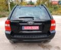 Чорний Кіа Sportage, об'ємом двигуна 2 л та пробігом 150 тис. км за 7000 $, фото 10 на Automoto.ua