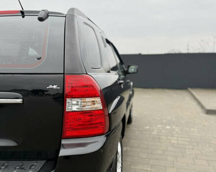 Чорний Кіа Sportage, об'ємом двигуна 1.98 л та пробігом 248 тис. км за 6999 $, фото 7 на Automoto.ua