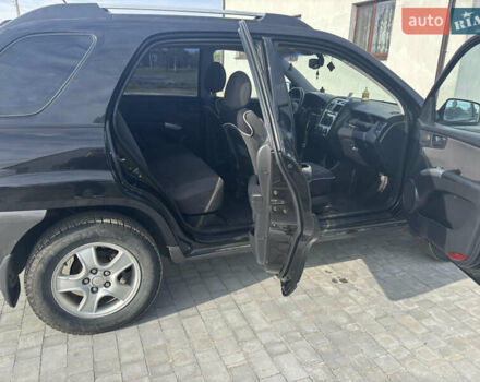 Черный Киа Sportage, объемом двигателя 2 л и пробегом 300 тыс. км за 6800 $, фото 7 на Automoto.ua
