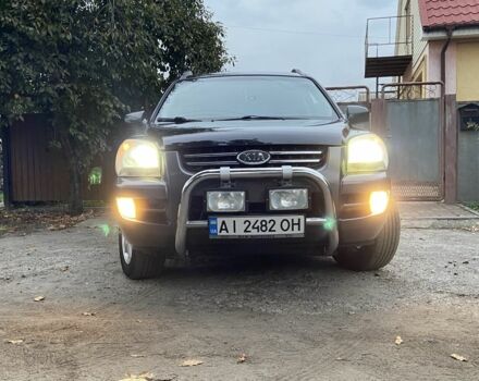 Чорний Кіа Sportage, об'ємом двигуна 2 л та пробігом 227 тис. км за 6900 $, фото 3 на Automoto.ua