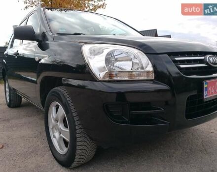 Чорний Кіа Sportage, об'ємом двигуна 2 л та пробігом 150 тис. км за 7000 $, фото 24 на Automoto.ua
