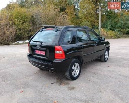 Чорний Кіа Sportage, об'ємом двигуна 2 л та пробігом 150 тис. км за 7000 $, фото 29 на Automoto.ua