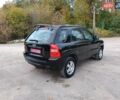 Чорний Кіа Sportage, об'ємом двигуна 2 л та пробігом 150 тис. км за 7000 $, фото 29 на Automoto.ua