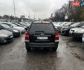 Чорний Кіа Sportage, об'ємом двигуна 2 л та пробігом 250 тис. км за 8300 $, фото 5 на Automoto.ua