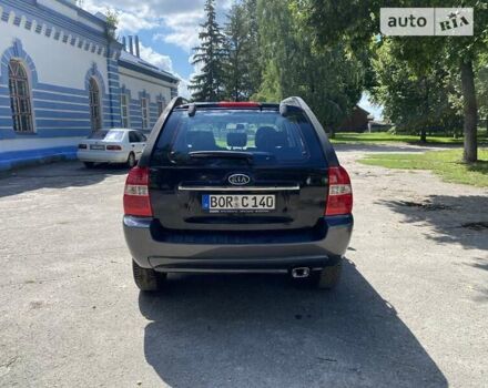 Черный Киа Sportage, объемом двигателя 1.98 л и пробегом 199 тыс. км за 8600 $, фото 12 на Automoto.ua