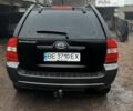 Черный Киа Sportage, объемом двигателя 2 л и пробегом 200 тыс. км за 8700 $, фото 3 на Automoto.ua