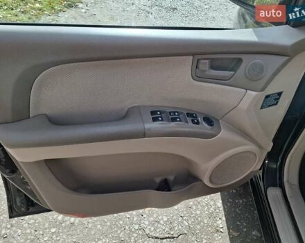 Черный Киа Sportage, объемом двигателя 1.99 л и пробегом 283 тыс. км за 6850 $, фото 21 на Automoto.ua