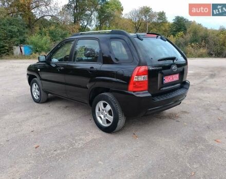 Чорний Кіа Sportage, об'ємом двигуна 2 л та пробігом 150 тис. км за 7000 $, фото 28 на Automoto.ua