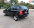 Чорний Кіа Sportage, об'ємом двигуна 2 л та пробігом 150 тис. км за 7000 $, фото 28 на Automoto.ua