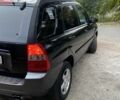 Чорний Кіа Sportage, об'ємом двигуна 2 л та пробігом 227 тис. км за 6900 $, фото 5 на Automoto.ua