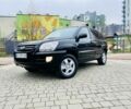 Черный Киа Sportage, объемом двигателя 2 л и пробегом 264 тыс. км за 8750 $, фото 1 на Automoto.ua