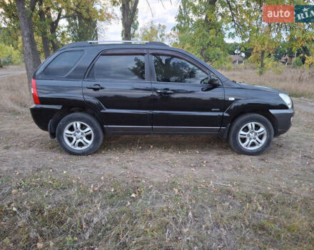 Черный Киа Sportage, объемом двигателя 2.7 л и пробегом 261 тыс. км за 8500 $, фото 6 на Automoto.ua