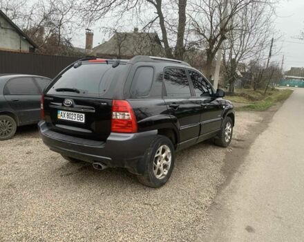 Черный Киа Sportage, объемом двигателя 2 л и пробегом 315 тыс. км за 6900 $, фото 3 на Automoto.ua