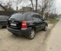 Черный Киа Sportage, объемом двигателя 2 л и пробегом 315 тыс. км за 6900 $, фото 3 на Automoto.ua