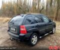 Черный Киа Sportage, объемом двигателя 2 л и пробегом 206 тыс. км за 8500 $, фото 2 на Automoto.ua