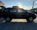 Чорний Кіа Sportage, об'ємом двигуна 2 л та пробігом 178 тис. км за 8800 $, фото 2 на Automoto.ua