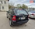 Черный Киа Sportage, объемом двигателя 2 л и пробегом 226 тыс. км за 7500 $, фото 6 на Automoto.ua
