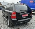 Черный Киа Sportage, объемом двигателя 2 л и пробегом 240 тыс. км за 7650 $, фото 4 на Automoto.ua