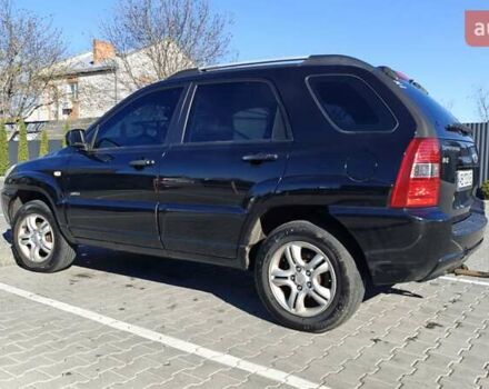 Черный Киа Sportage, объемом двигателя 1.98 л и пробегом 234 тыс. км за 8000 $, фото 2 на Automoto.ua