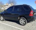 Черный Киа Sportage, объемом двигателя 1.98 л и пробегом 234 тыс. км за 8000 $, фото 2 на Automoto.ua