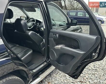 Черный Киа Sportage, объемом двигателя 2 л и пробегом 240 тыс. км за 7650 $, фото 66 на Automoto.ua