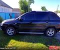 Черный Киа Sportage, объемом двигателя 2 л и пробегом 221 тыс. км за 8000 $, фото 1 на Automoto.ua