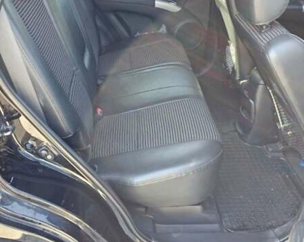 Черный Киа Sportage, объемом двигателя 1.98 л и пробегом 234 тыс. км за 8000 $, фото 22 на Automoto.ua