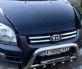 Черный Киа Sportage, объемом двигателя 2 л и пробегом 270 тыс. км за 8500 $, фото 1 на Automoto.ua